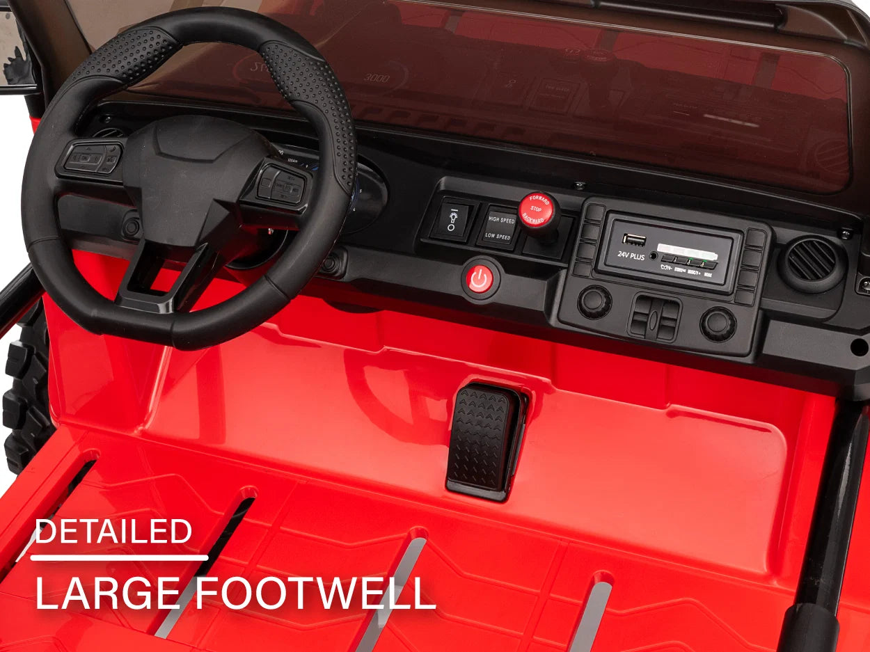Kids ride-on Jeep interior with steering wheel, multimedia dashboard and large footwell